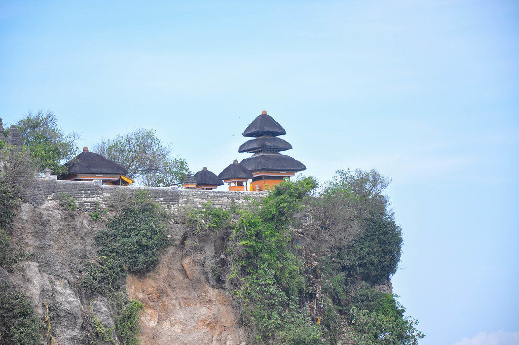 Pura Luhur Uluwatu on its cliff, some 70 metres above the Indian Ocean — a sea temple at the impure, dangerous kelod (seaward) pole, yet one of Bali's holiest.