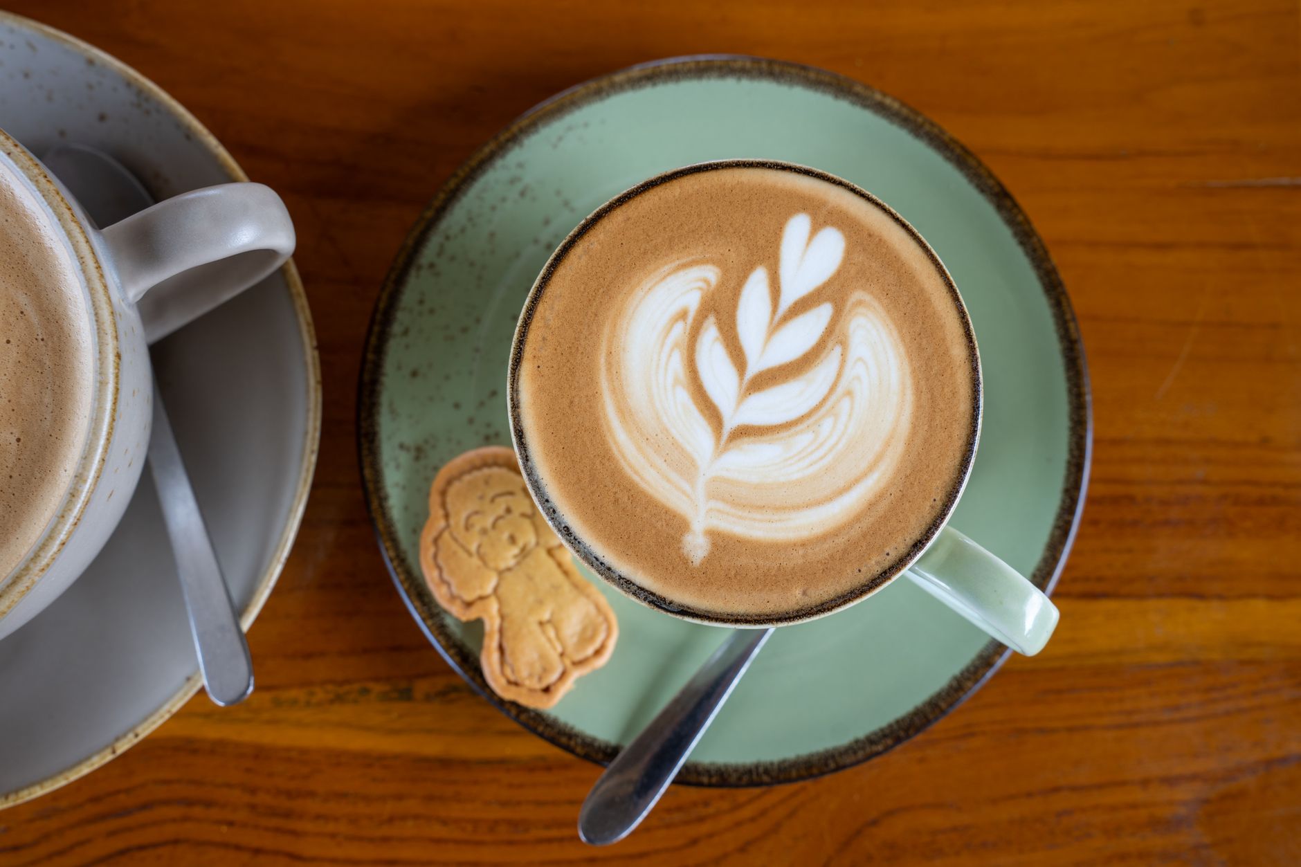 A cup of latte-art coffee served in Bali
