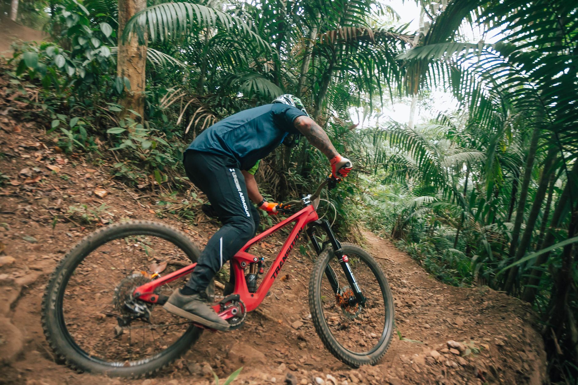 A mountain biker on a challenging Bali trail