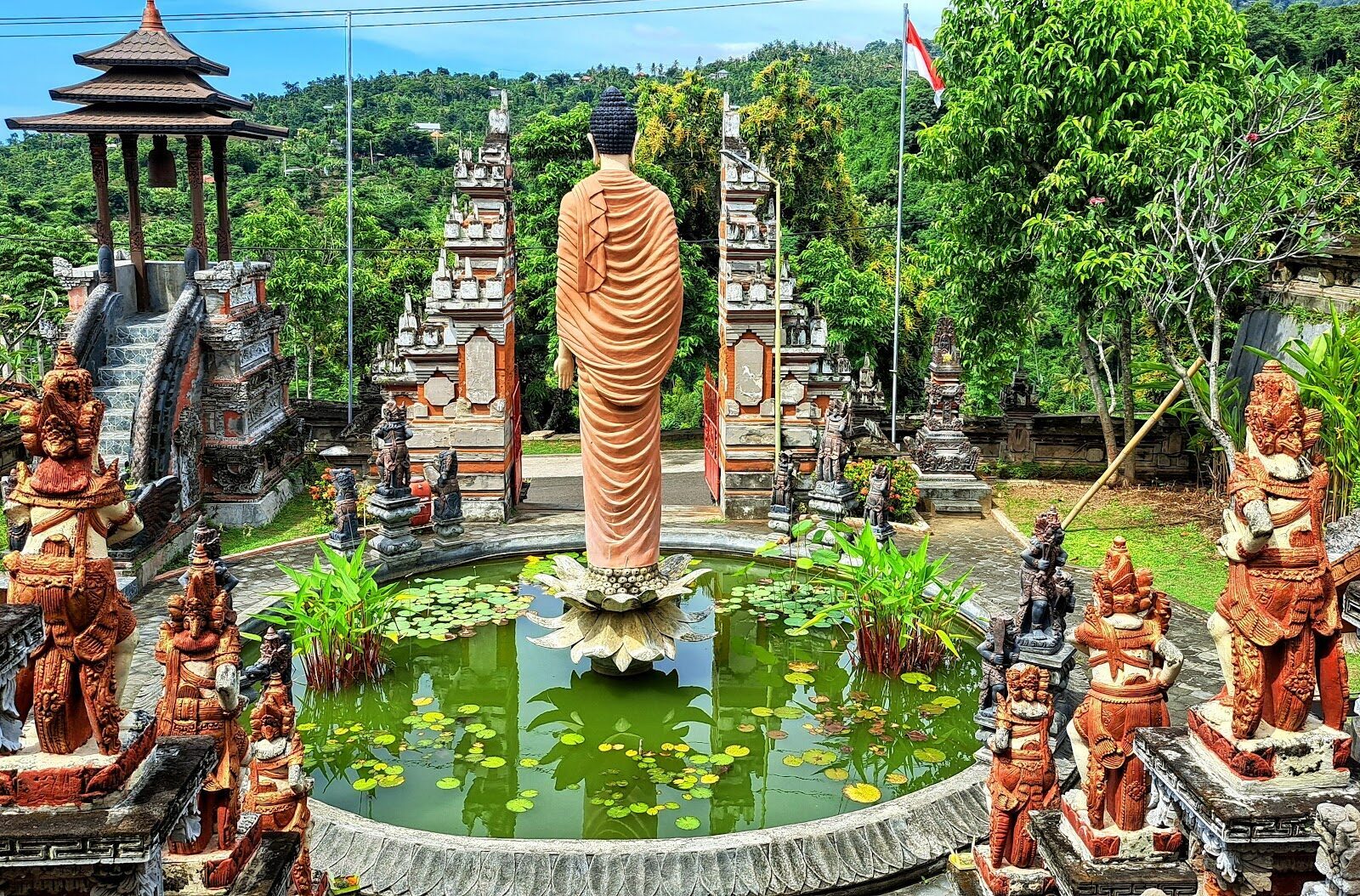 A gilded Buddha in the gardens at Brahmavihara-Arama.
