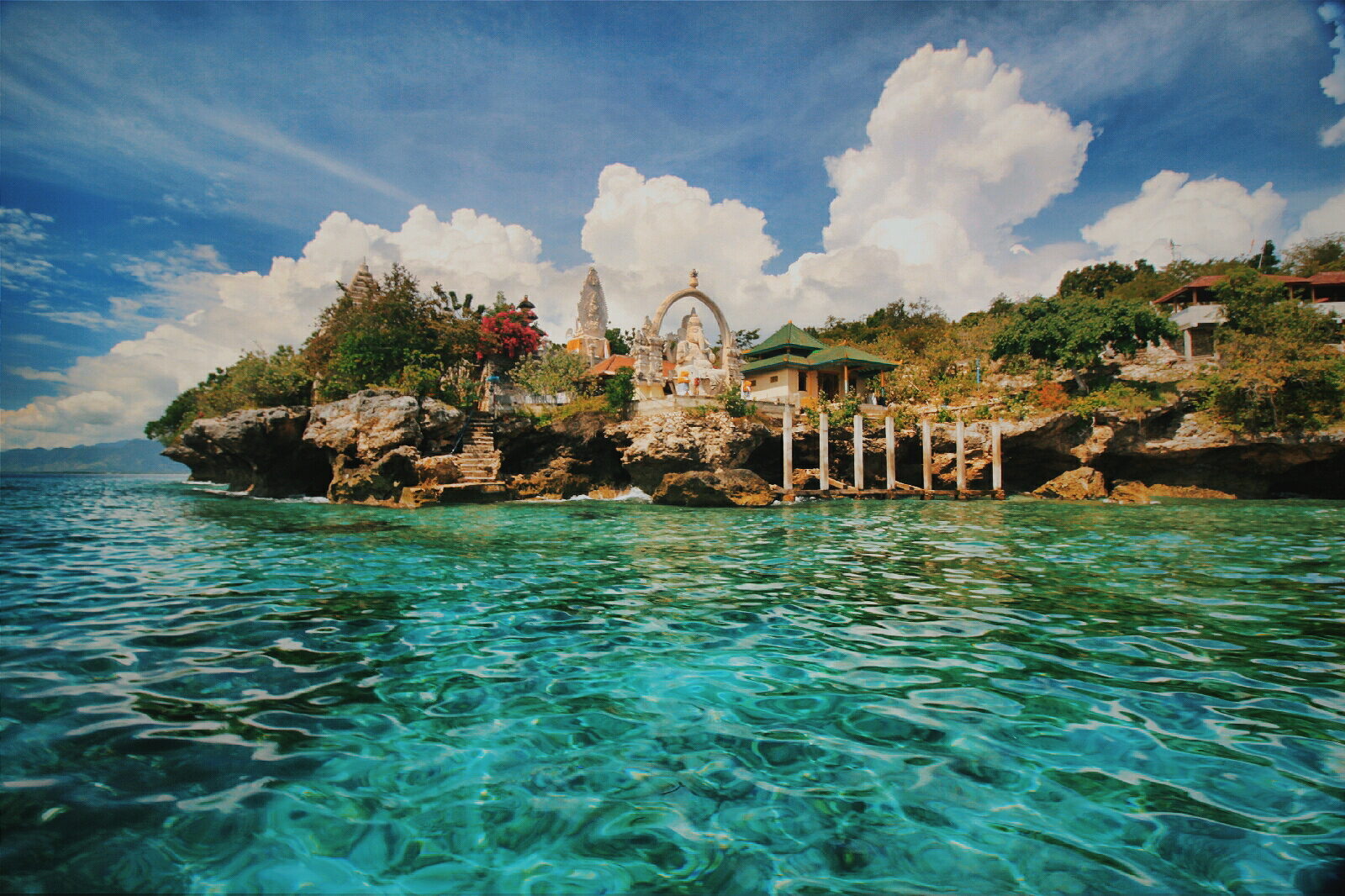 Menjangan Island in West Bali National Park — the north coast's real underwater prize, ~1.5–2 hours west, with clear water and a diveable wall.