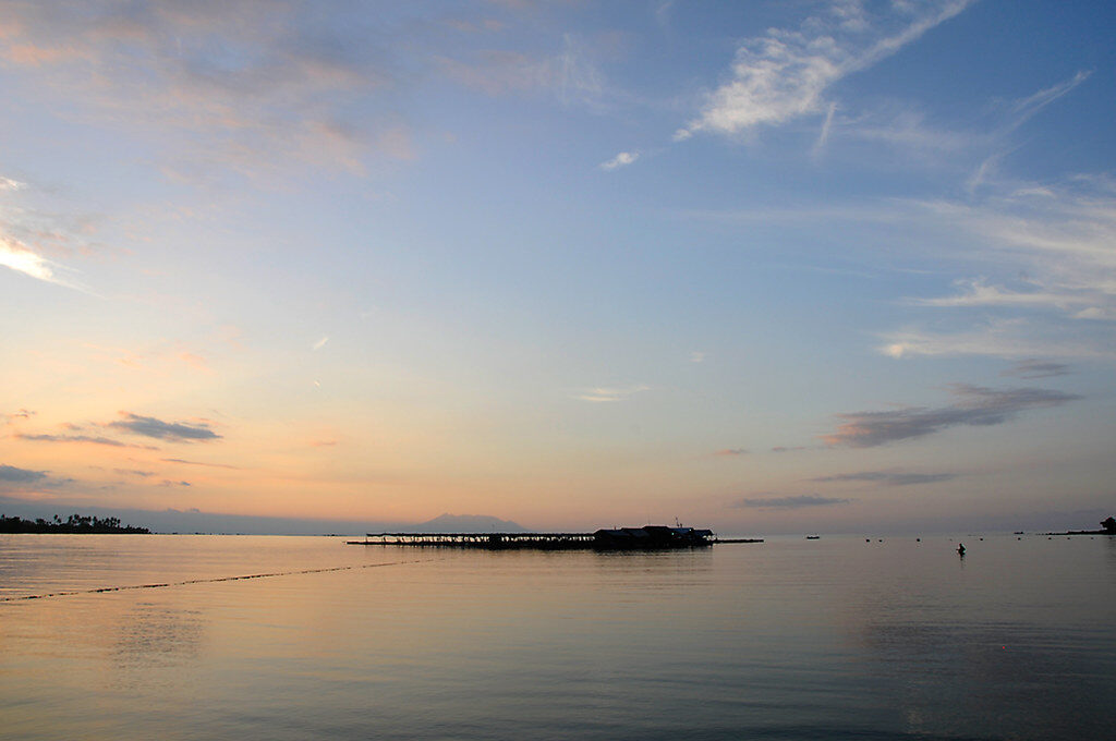 Pemuteran's calm bay at first light — the quiet north-coast base 15 minutes from the jetty.