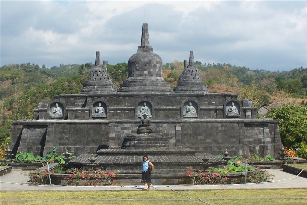 The main stupa at Brahmavihara-Arama, with a visitor for scale — serene, and almost always quiet.