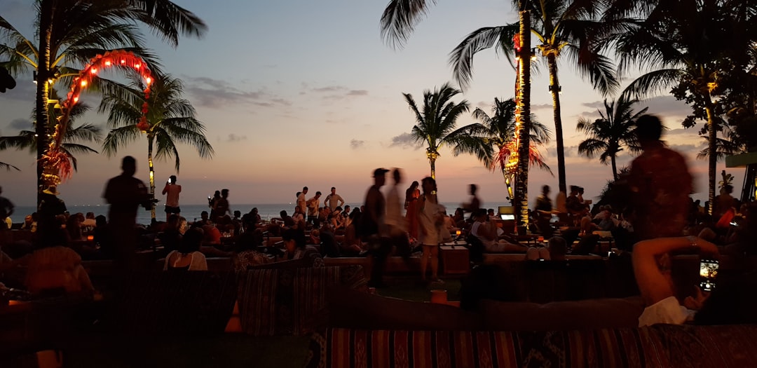 A lively beach-club crowd at dusk, Seminyak