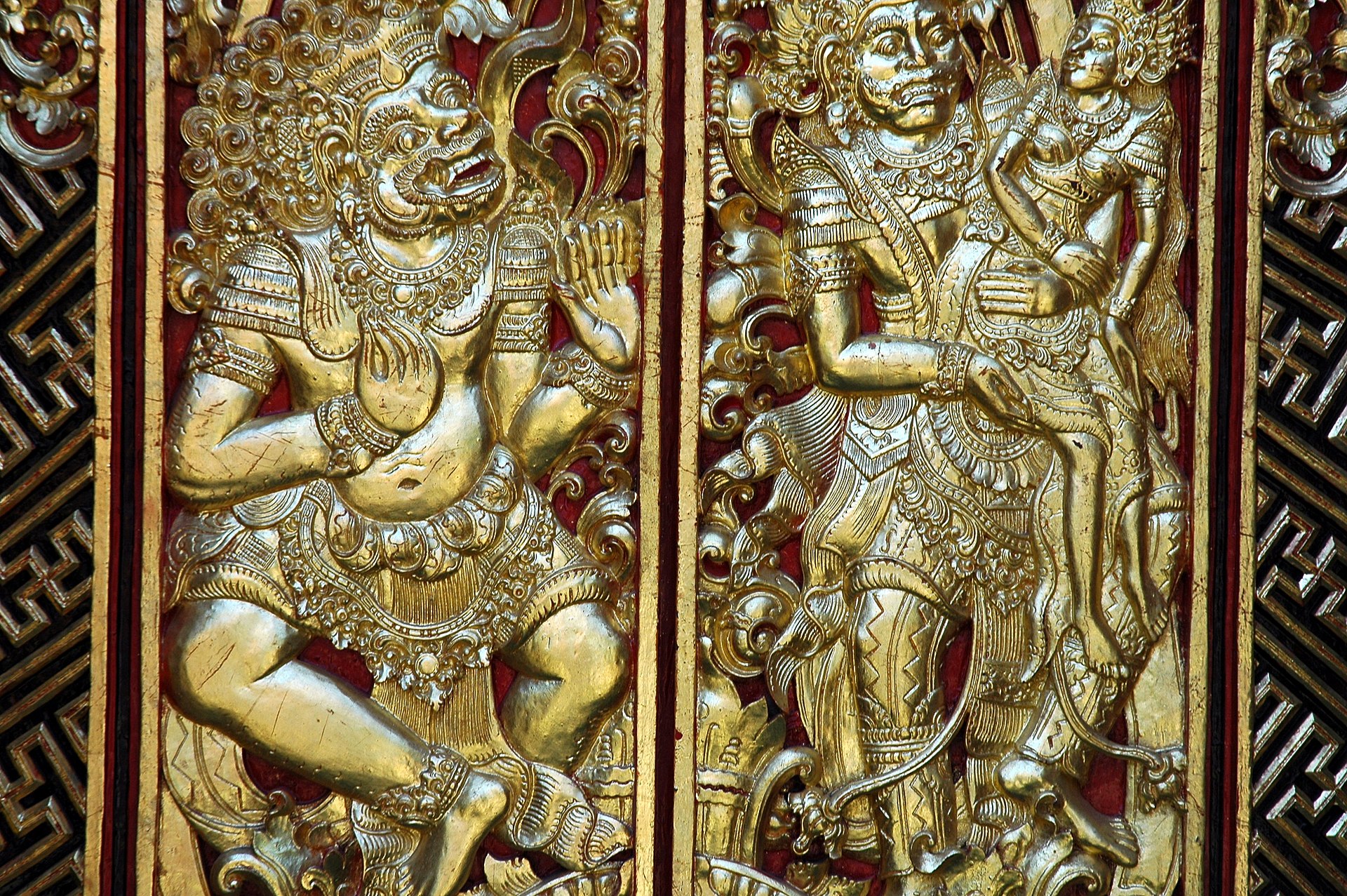 Ornate gilded temple doors at Pura Petitenget, Seminyak