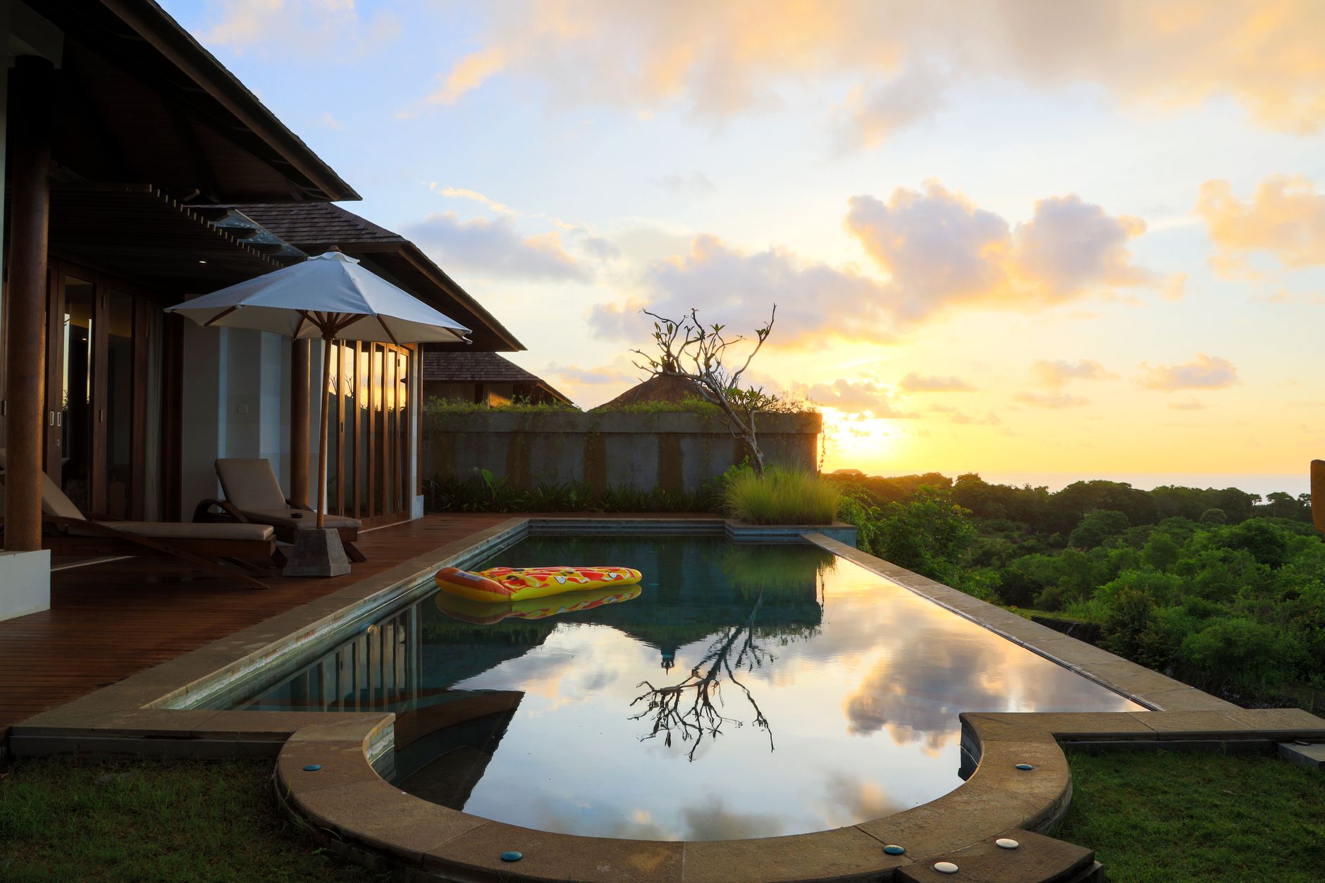 A south-Bali villa infinity pool at golden hour