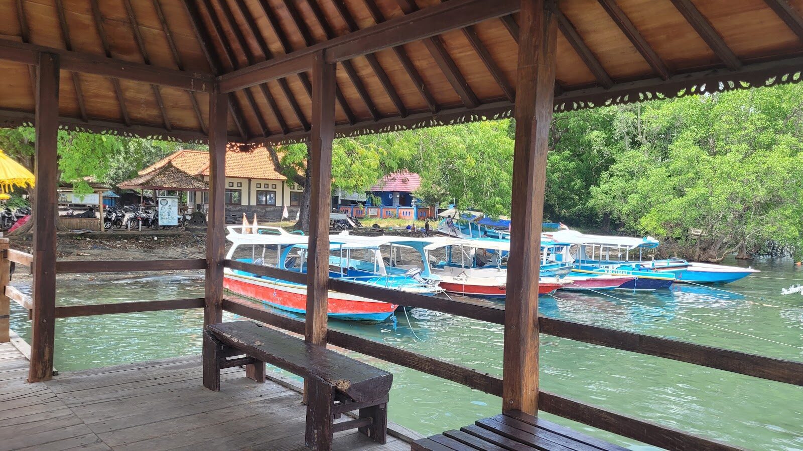 Chartered boats moored at Labuan Lalang, the park's boat-access point.