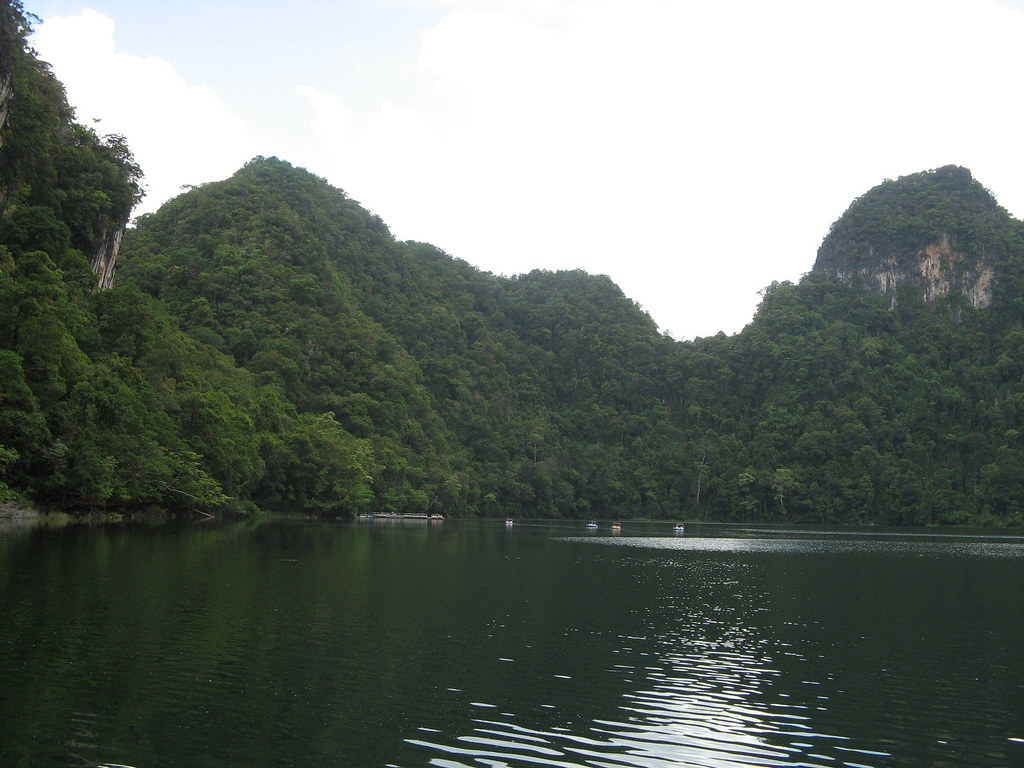 Tasik Dayang Bunting — the Pregnant Maiden Lake, ringed by jungle cliffs.